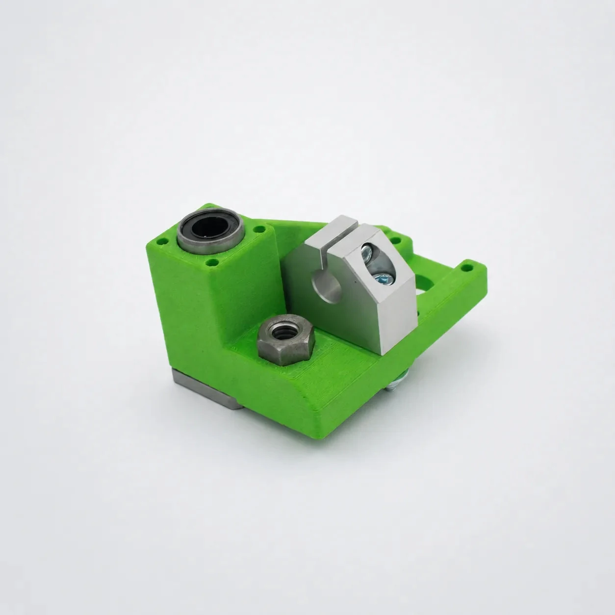 Green 3D-printed custom assembled bracket with bearing and metal hardware